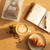 ORIN Lumina kava ob cappuccinu, beležki in rogljičku